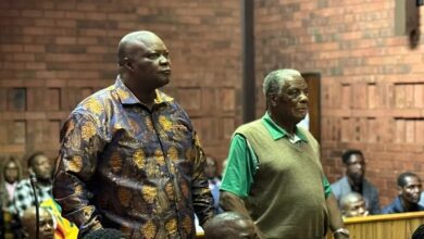 Job Sikhala (left) with his uncle Alexander Thema