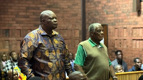 Job Sikhala (left) with his uncle Alexander Thema