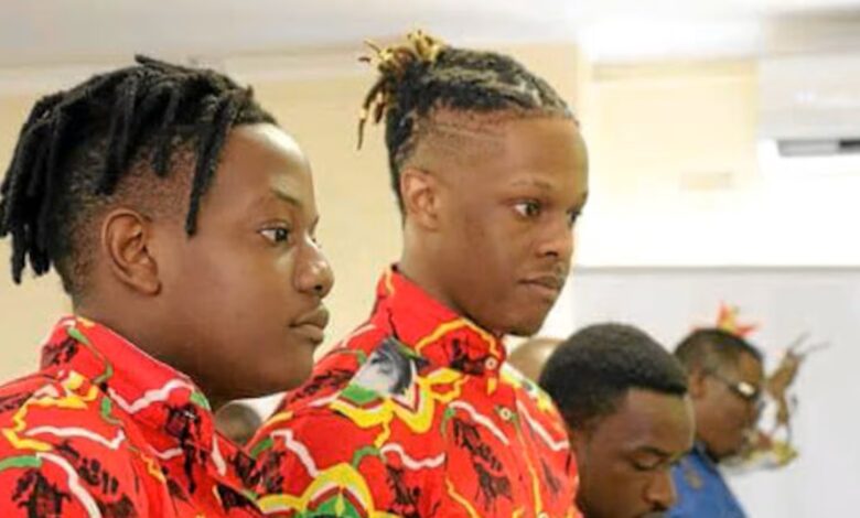 Bellarmine Chatunga and Robert Mugabe Jnr as teenagers