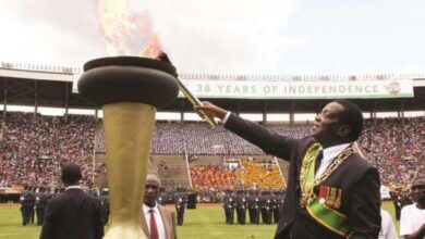 President Emmerson Mnangagwa with independence flame