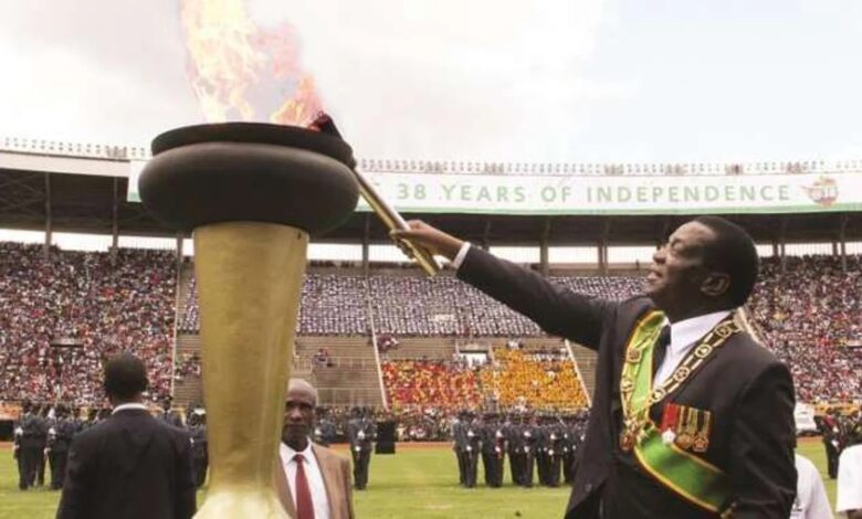 President Emmerson Mnangagwa with independence flame